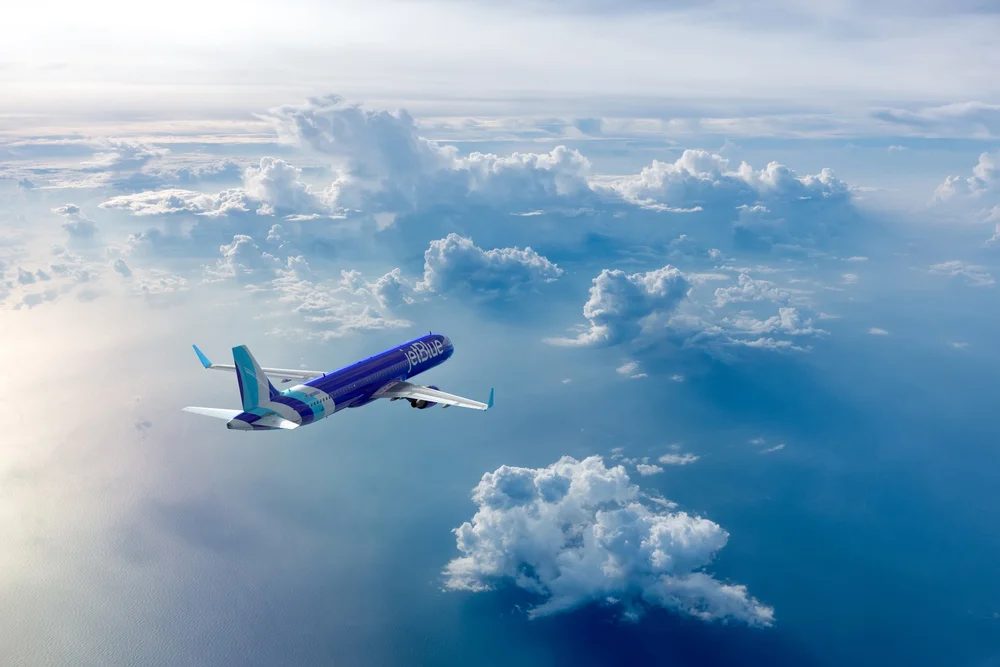 JetBlue A321neo above clouds